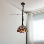 Lámpara colgante Costa de vidrio mediterráneo, encendida creando luz cálida