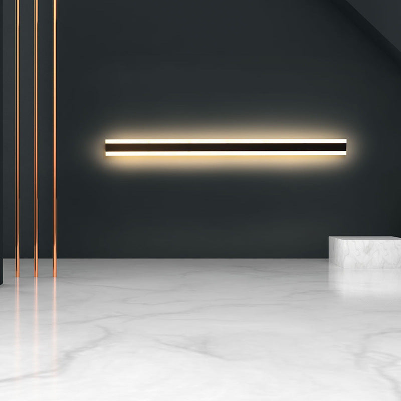Aplique lineal Kiro de acrílico LED, en un ambiente residencial acogedor