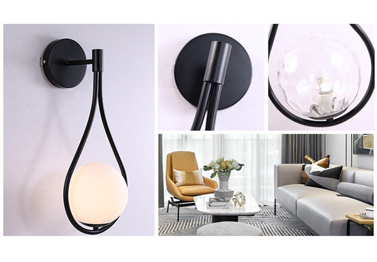 Aplique de pared Selene de vidrio opal, en un salón elegante