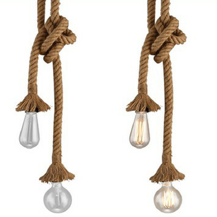 Lámpara colgante Sisal de cuerda de cáñamo, encendida creando luz cálida