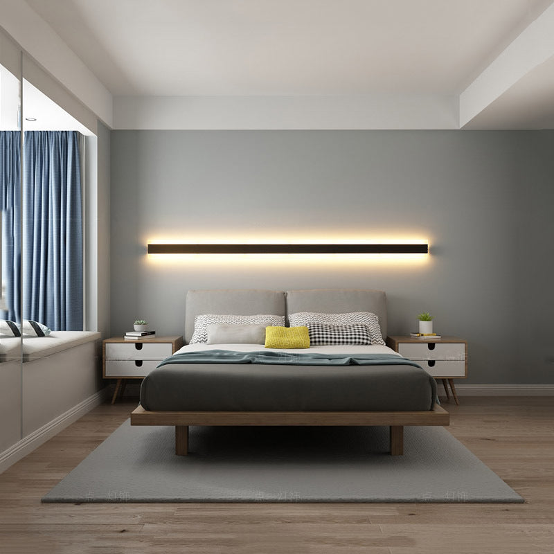 Aplique lineal Kiro de acrílico LED, en un salón elegante