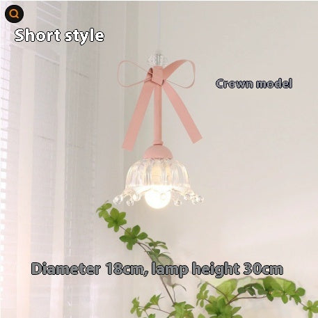 Lámpara colgante Lazo de estilo cream, en un ambiente residencial acogedor