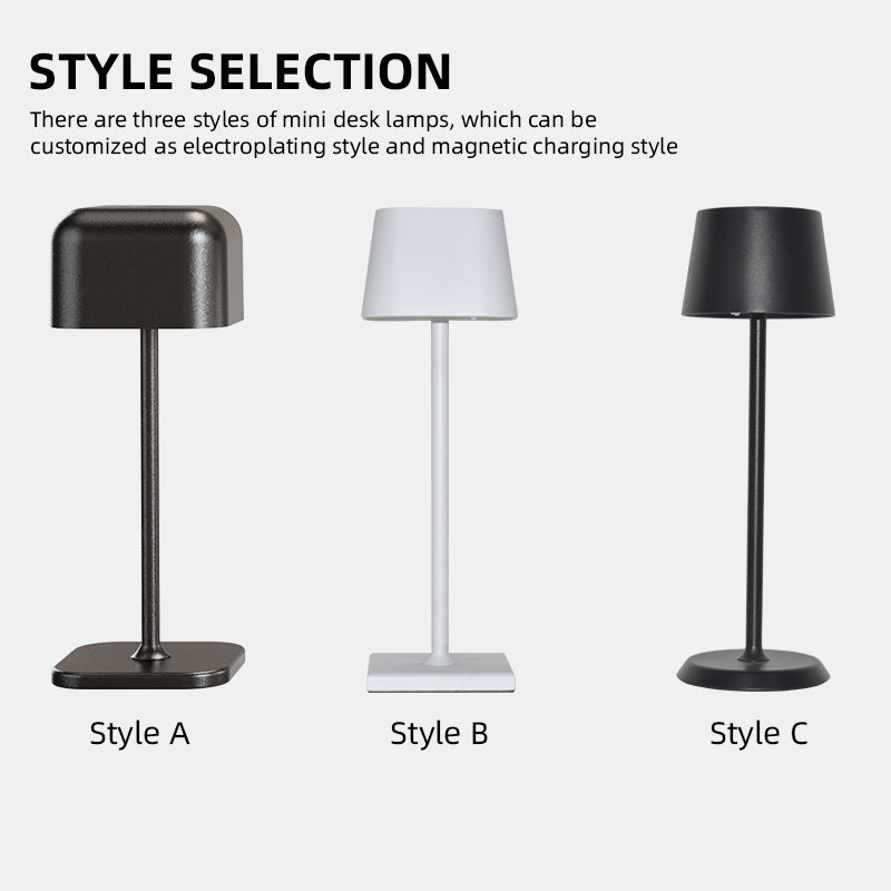 Lámpara de mesa Iris LED recargable, encendida creando luz cálida