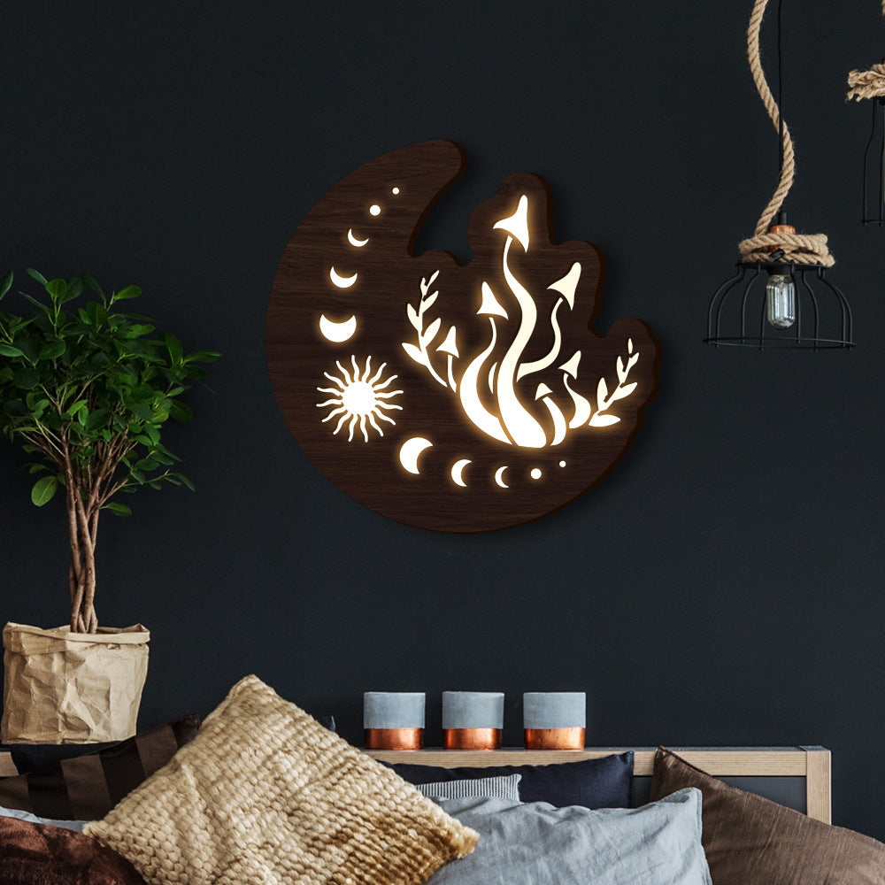 Lámpara colgante decorativa Luna de madera de tilo, en un salón elegante
