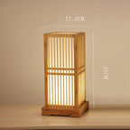 Lámpara de mesa Shoji de bambú, en un ambiente residencial acogedor