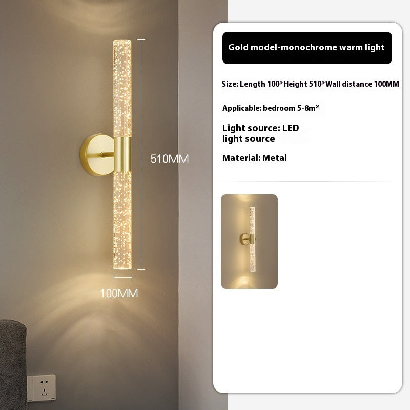 Aplique de pared Perla de hierro con burbujas, encendido creando luz cálida