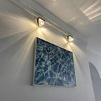 Aplique de pared Fleur de cristal y cobre, detalle del acabado