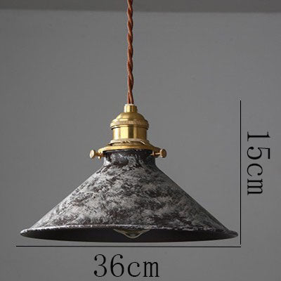 Lámpara colgante Bistró de cobre con luz cálida, integrada en la decoración del hogar